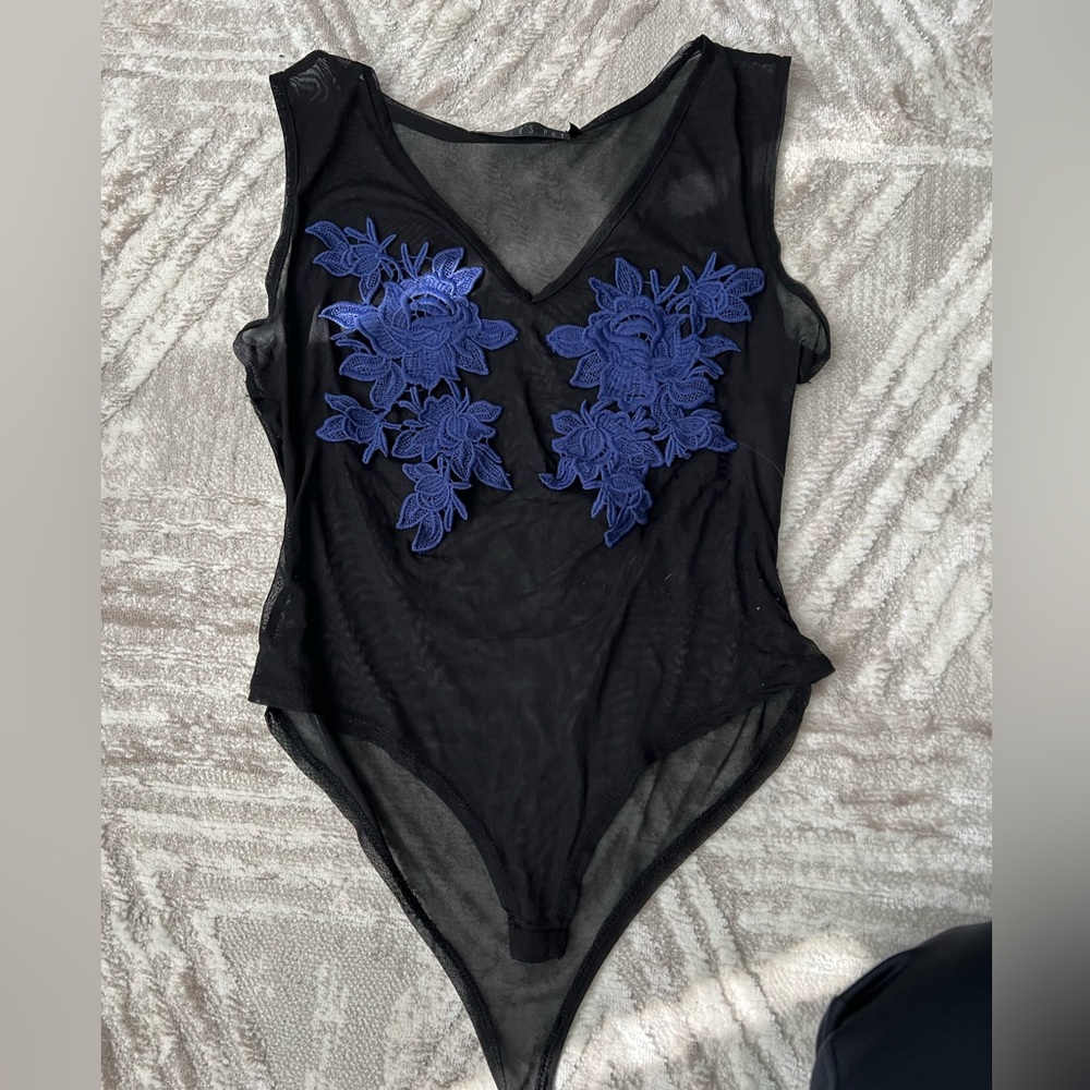Black body suit with blue flowers